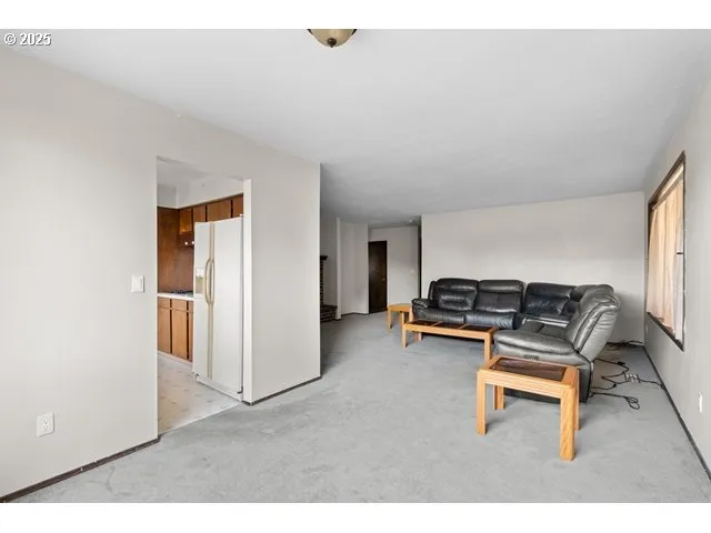 a living room with a couch and a table