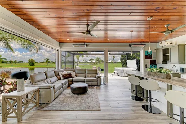 a room with lots of table and chairs