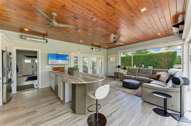 a bathroom with a shower sink and mirror