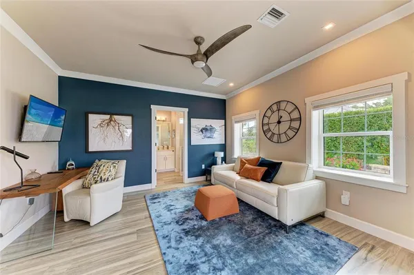 a sitting area with furniture and garden view