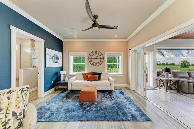 a view of a couches in patio with a yard