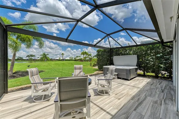 a view of a swimming pool with a patio