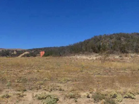 a view of mountain with sunset view