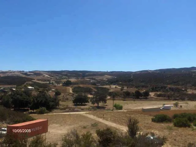 a view of city with ocean