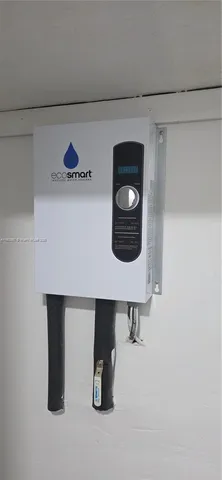 a backyard of a house with barbeque oven and outdoor seating