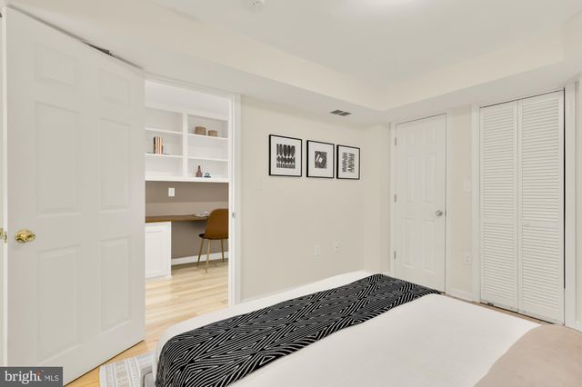 a view of a patio with table and chairs