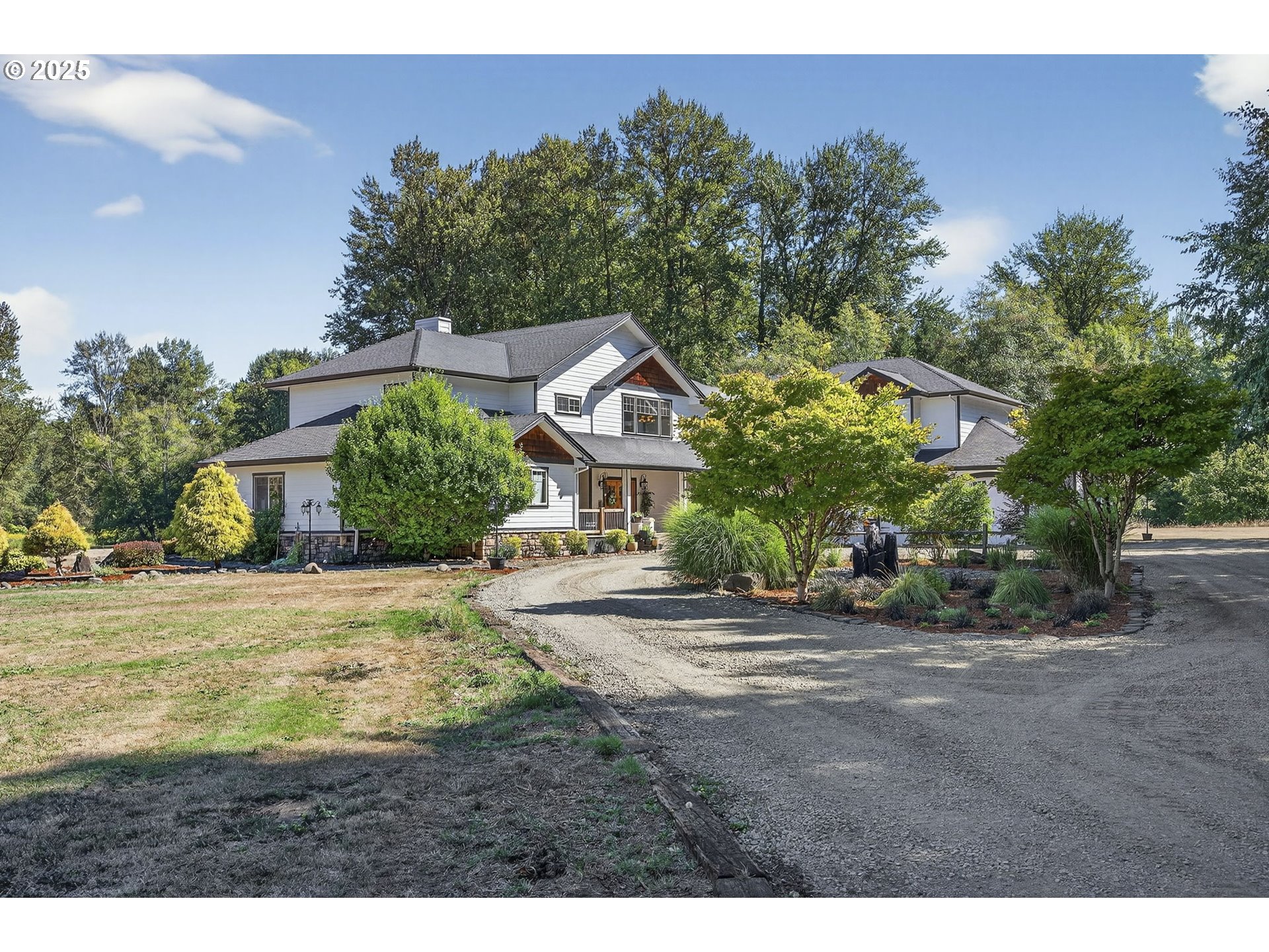 15047 South Macksburg Road Mulino, OR 97042 - Photo 3 of 48 a front view of a house with a yard