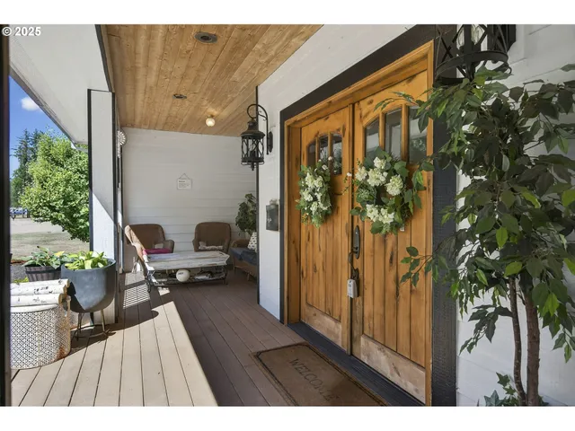 a view of living room and patio area