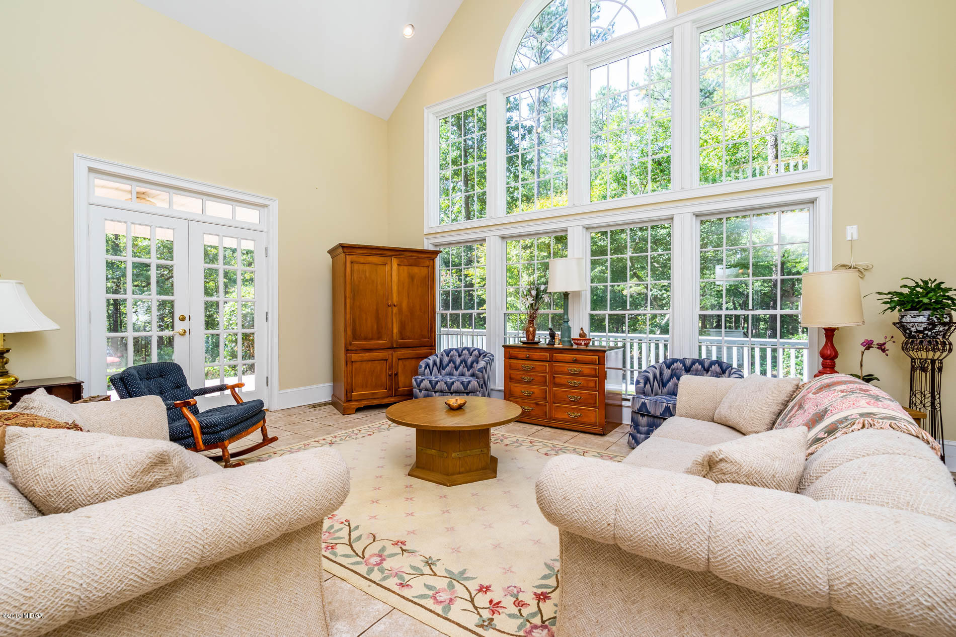 9748 Estes Road Macon, GA 31220 - Photo 23 of 144 a living room with furniture and a large window