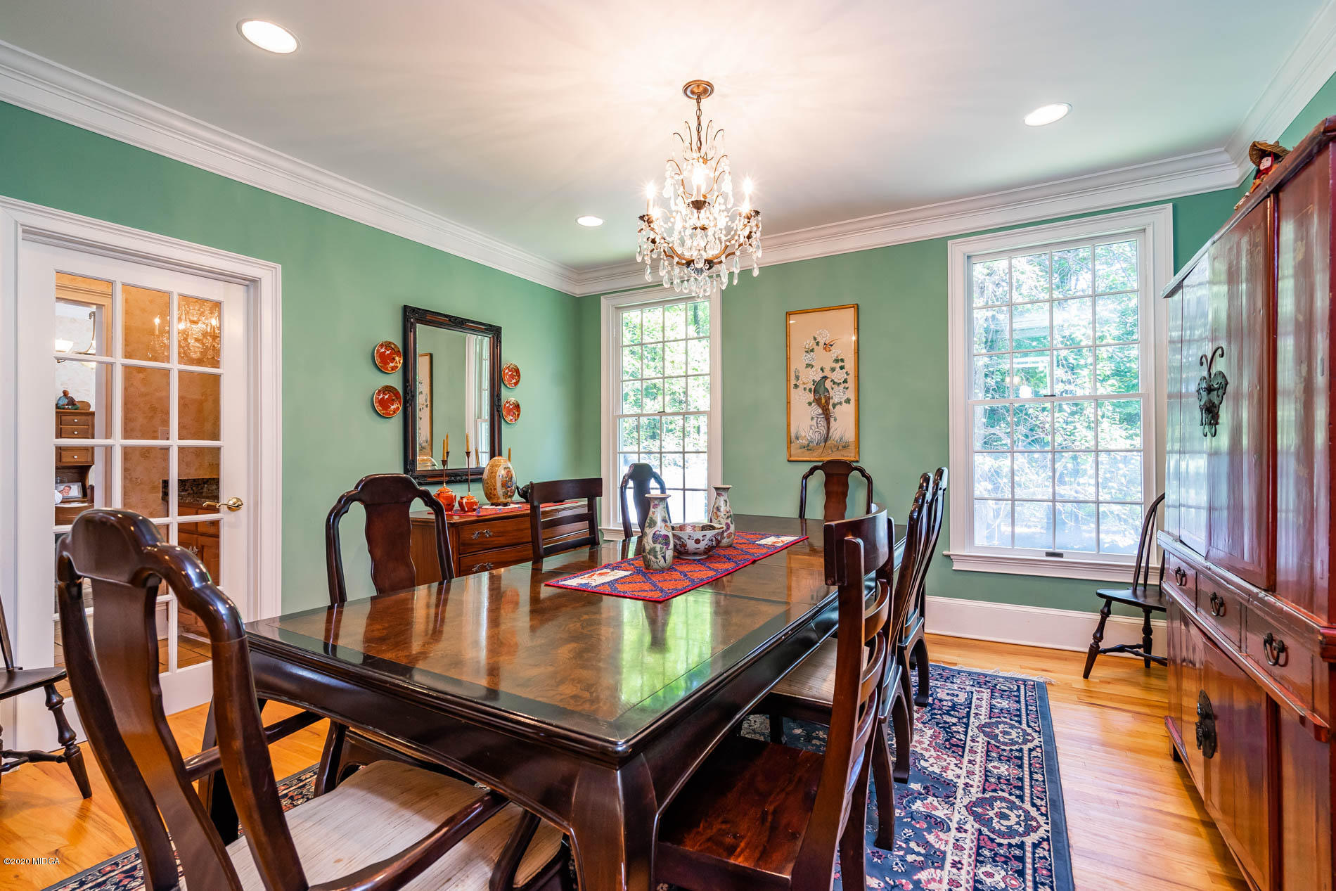 9748 Estes Road Macon, GA 31220 - Photo 90 of 144 a view of a dining room with furniture window and wooden floor