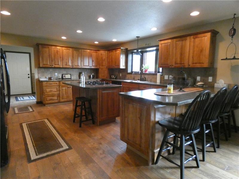 246 Burdette Road Stoneboro, PA 16153 - Photo 14 of 24 Open floor plan kitchen with bar seating.