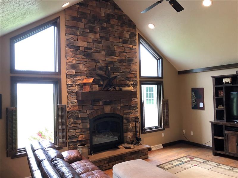 246 Burdette Road Stoneboro, PA 16153 - Photo 18 of 24 Floor to ceiling stone gas fireplace.
