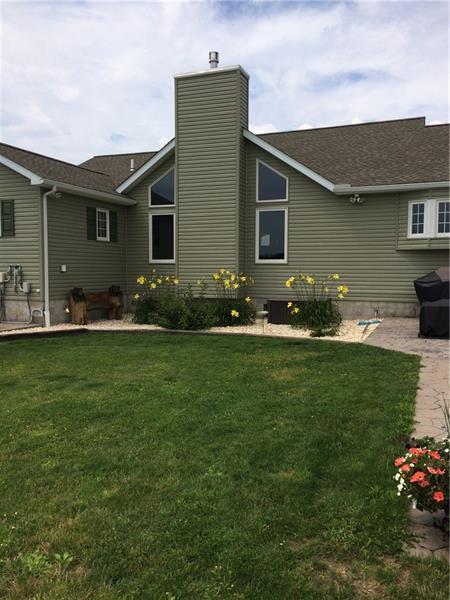 246 Burdette Road Stoneboro, PA 16153 - Photo 5 of 24 Back of the house with beautiful perennials.