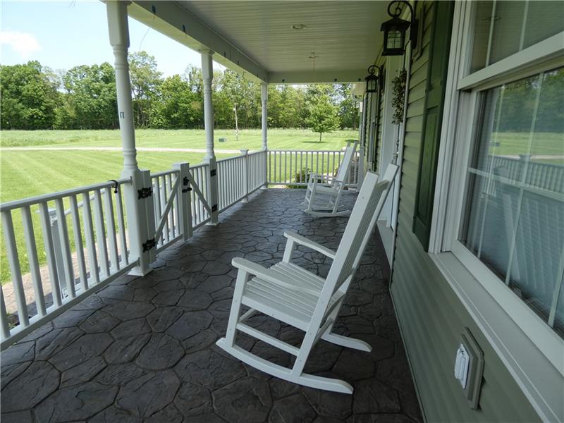 246 Burdette Road Stoneboro, PA 16153 - Photo 6 of 24 Front stamp stone porch with gate.