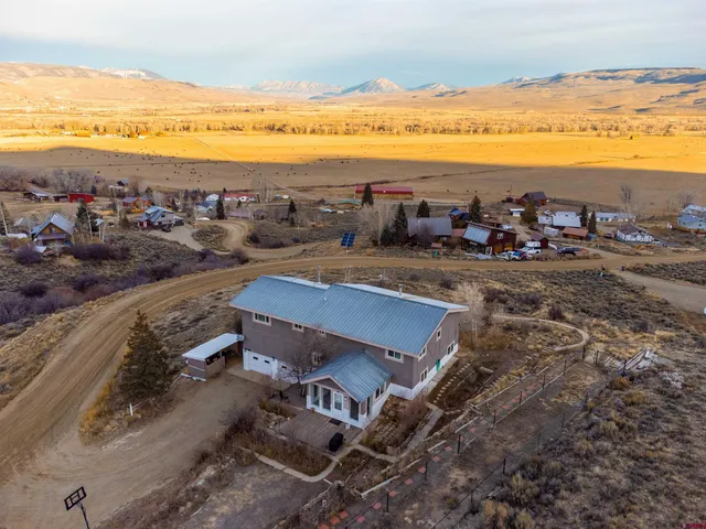 a view of an ocean and a mountain