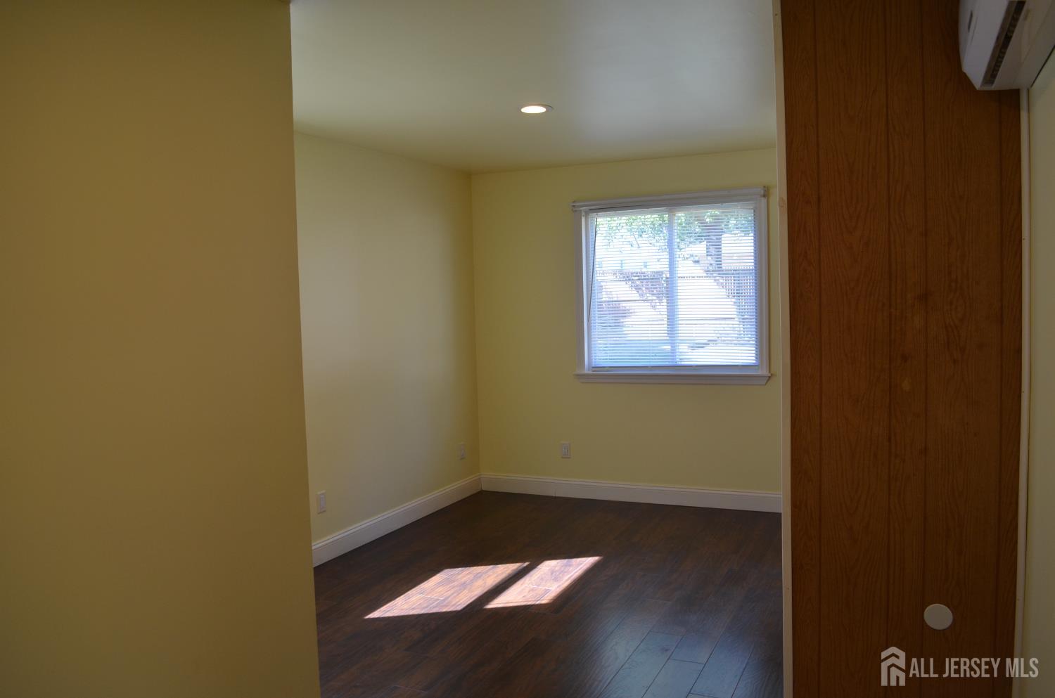 550 4th Street Dunellen, NJ 08812 - Photo 13 of 30 an empty room with windows