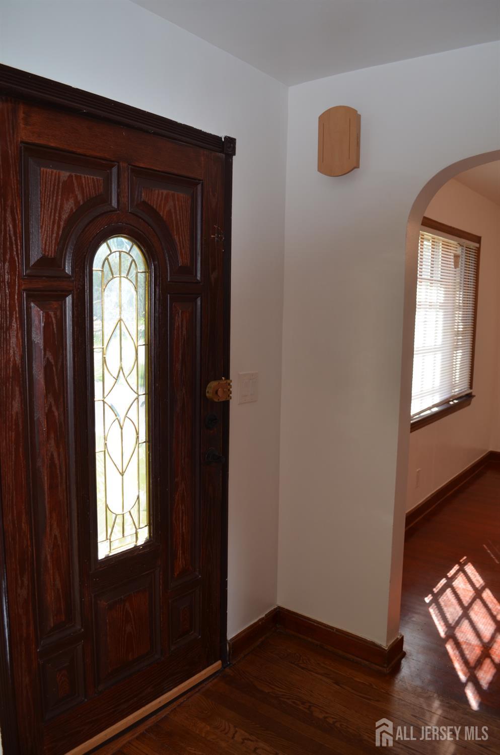 550 4th Street Dunellen, NJ 08812 - Photo 19 of 30 a view of entryway and wooden floor