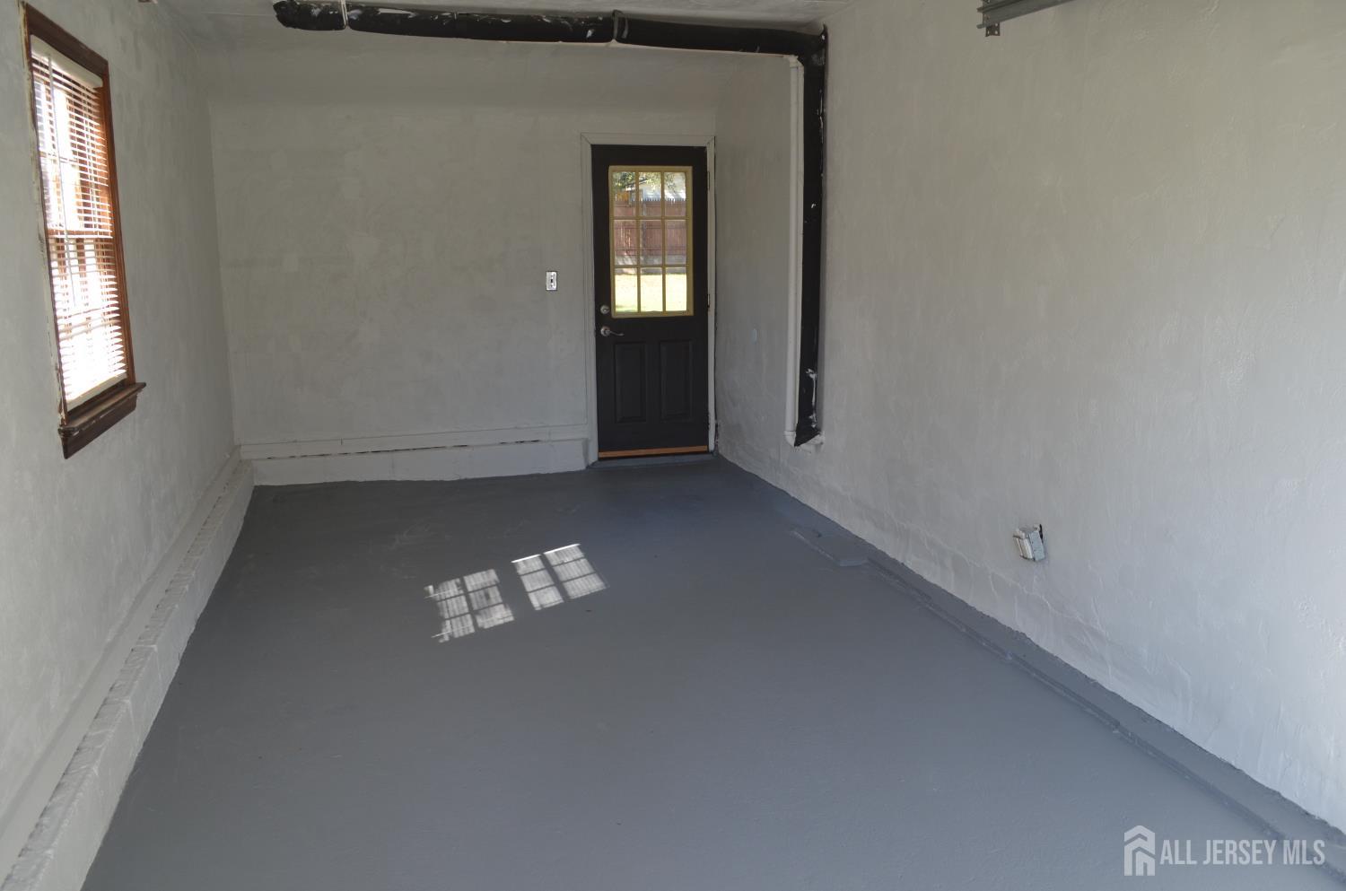 550 4th Street Dunellen, NJ 08812 - Photo 20 of 30 an empty room with windows