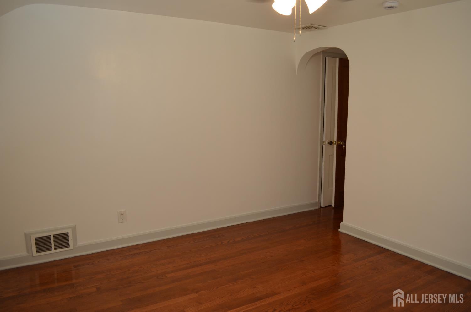 550 4th Street Dunellen, NJ 08812 - Photo 7 of 30 a view of a room with wooden floor