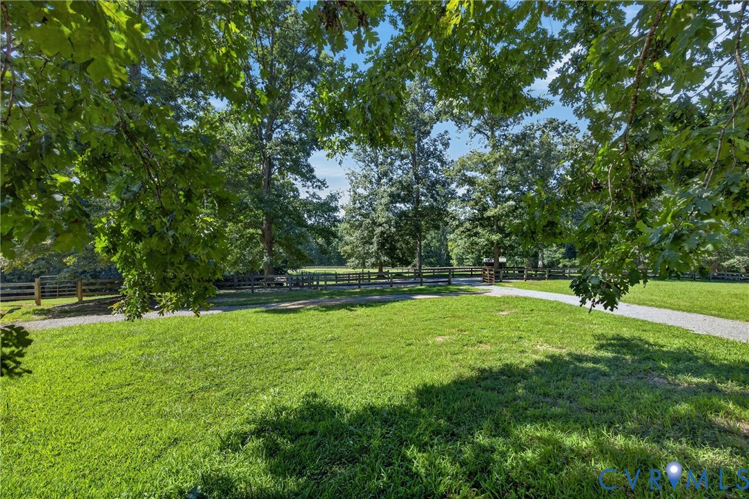 1108 Shallow Well Road Manakin-Sabot, VA 23103 - Photo 82 of 86 Expansive green lawn with mature trees and a grave