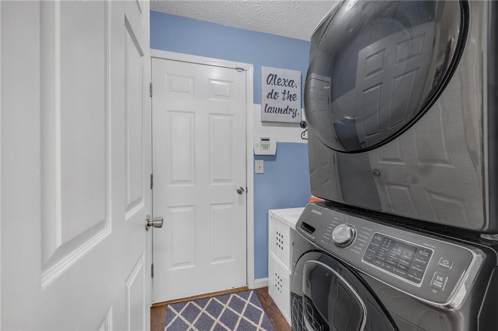 642 Lakes Circle Lithonia, GA 30058 - Photo 14 of 26 a utility room with dryer and washer