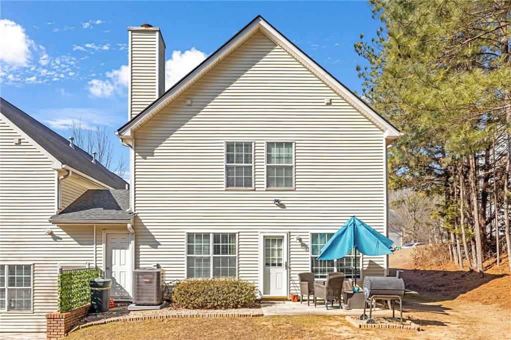 642 Lakes Circle Lithonia, GA 30058 - Photo 26 of 26 a view of a house with a patio