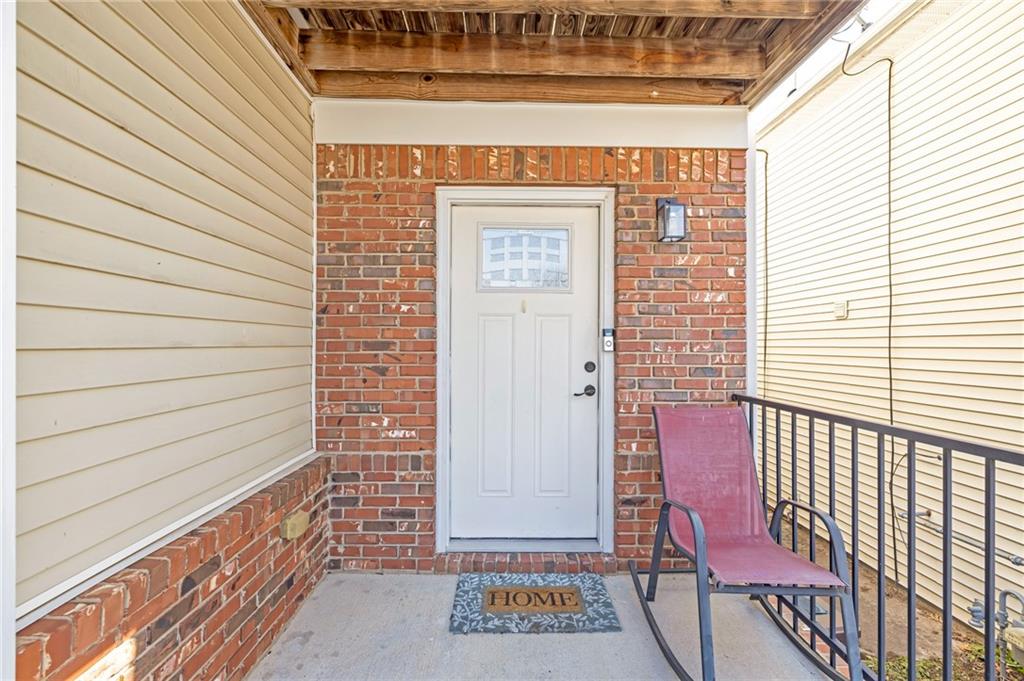 642 Lakes Circle Lithonia, GA 30058 - Photo 3 of 26 a view of a door with a door and wooden floor