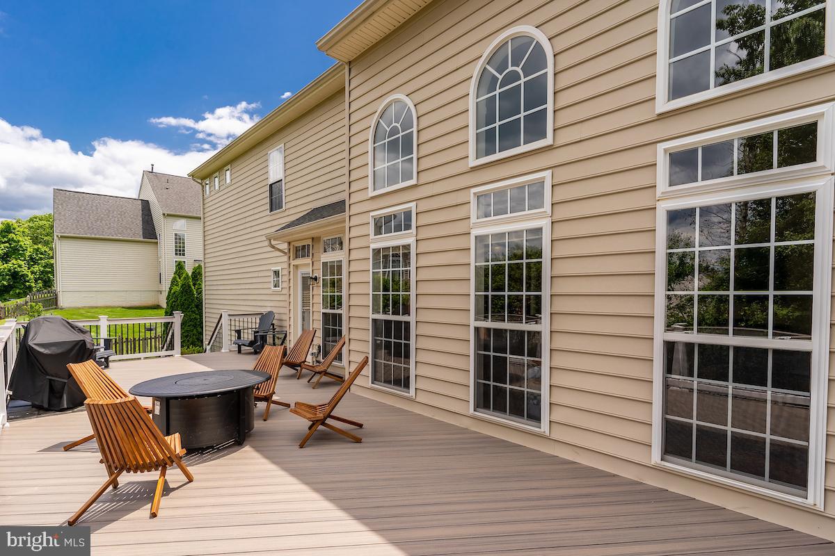 40506 Banshee Drive Leesburg, VA 20175 - Photo 31 of 36 Expansive composite deck spans back of the home