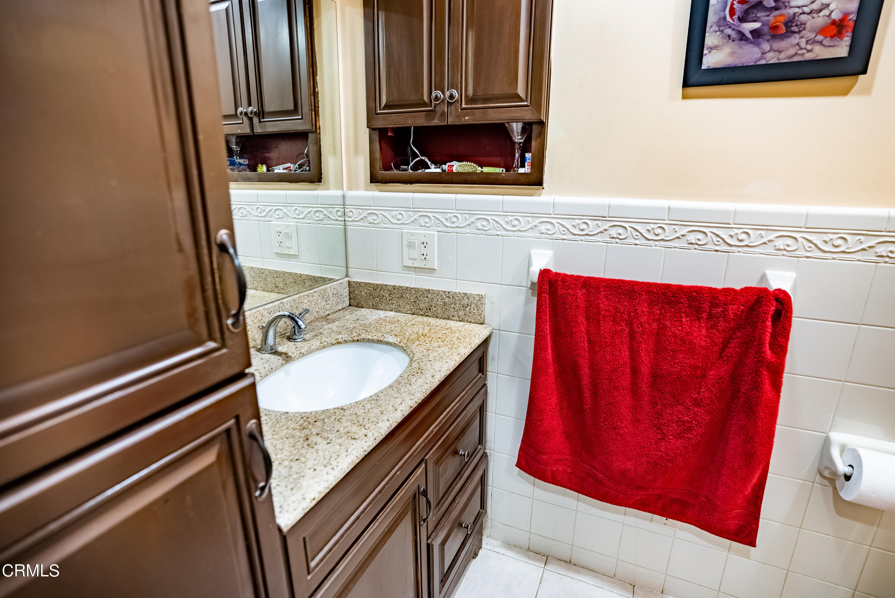 4731 Reading Drive Oxnard, CA 93033 - Photo 17 of 25 a bathroom with a sink and a mirror