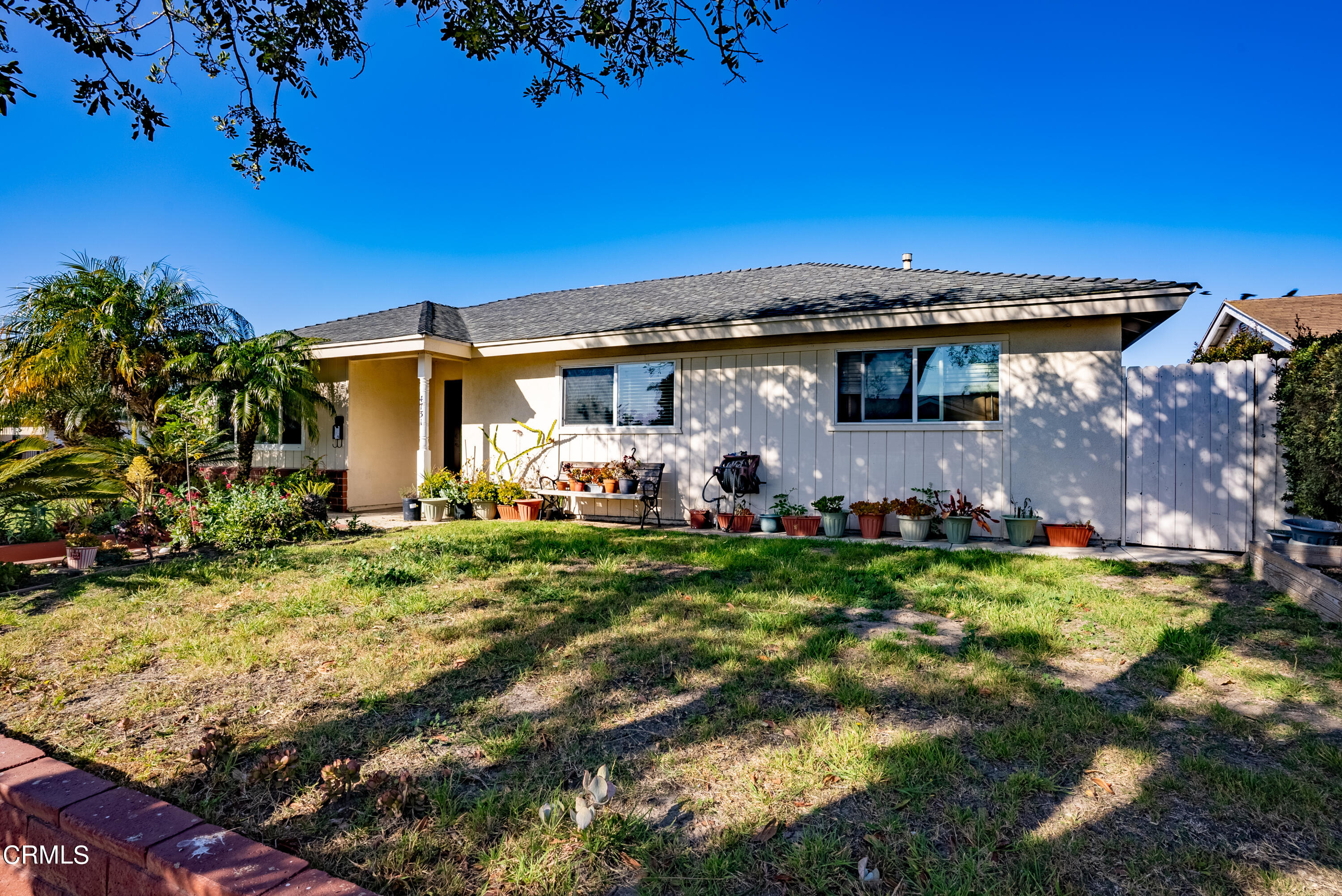 4731 Reading Drive Oxnard, CA 93033 - Photo 2 of 25 a front view of a house with garden