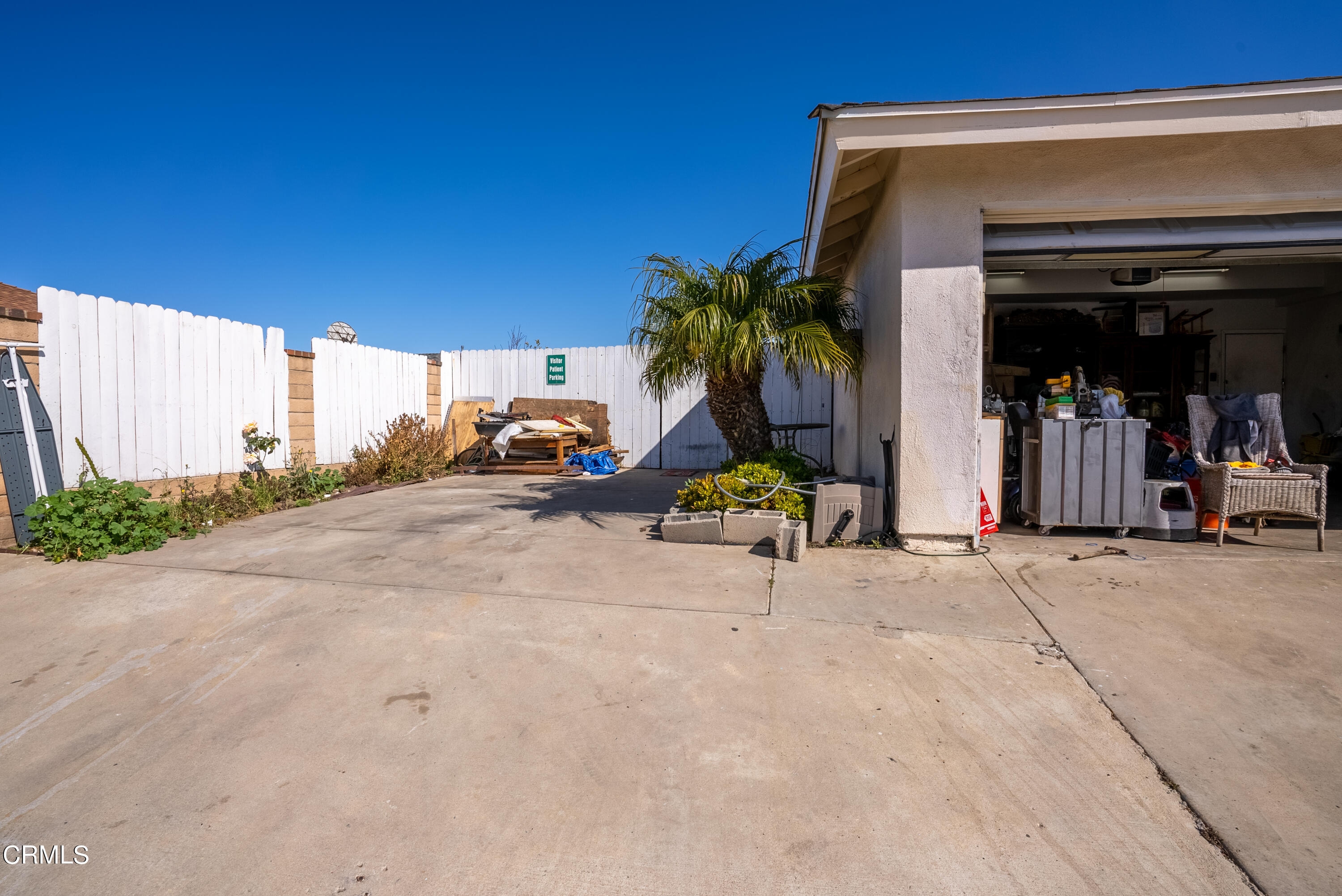 4731 Reading Drive Oxnard, CA 93033 - Photo 24 of 25 a view of a street with a garage