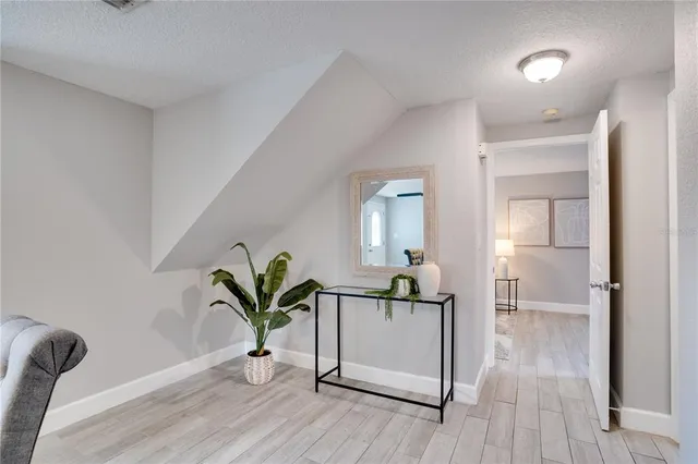 a view of entryway with wooden floor