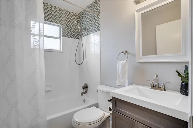 a view of a pathway with a house in the background