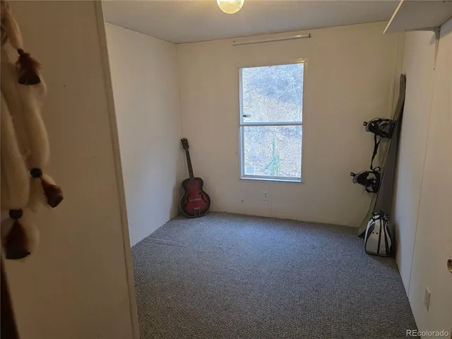 a view of a room with windows