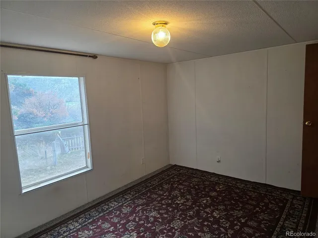a view of a window in an empty room