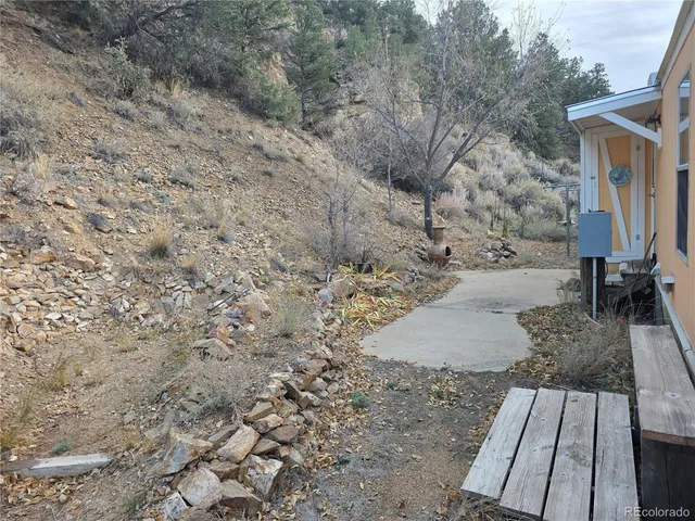 a view of a backyard of a house