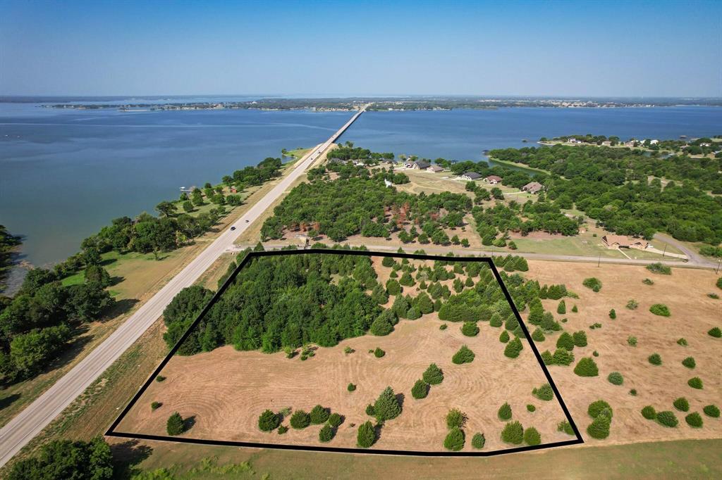 11 Baybridge Road Kerens, TX 75144 - Photo 1 of 11 Drone / aerial view with a rural view and a water view