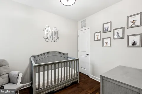 a view of kitchen with furniture and wooden floor
