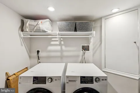 a view of a brick house with a large windows