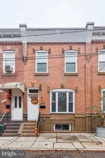 a front view of a building with street