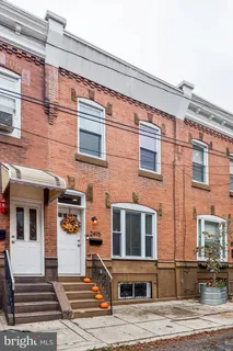 a front view of a building with street