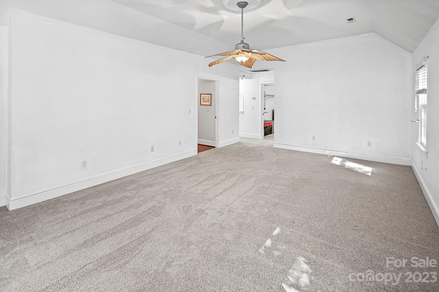 255 Thousand Oaks Road Indian Land, SC 29707 - Photo 17 of 37 an empty room with a ceiling fan and window