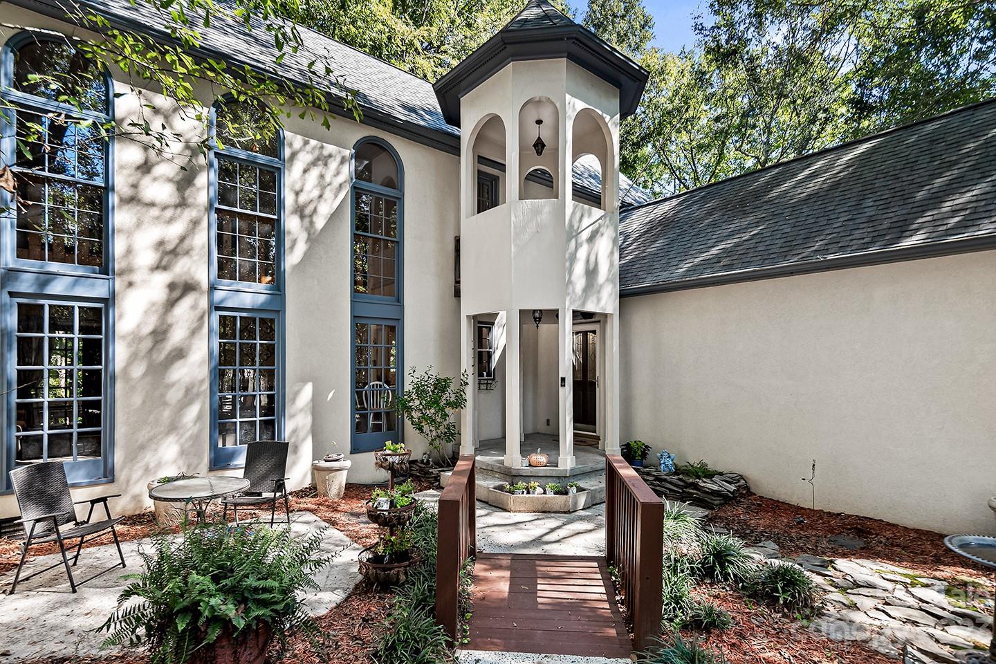 255 Thousand Oaks Road Indian Land, SC 29707 - Photo 2 of 37 a front view of a house with garden
