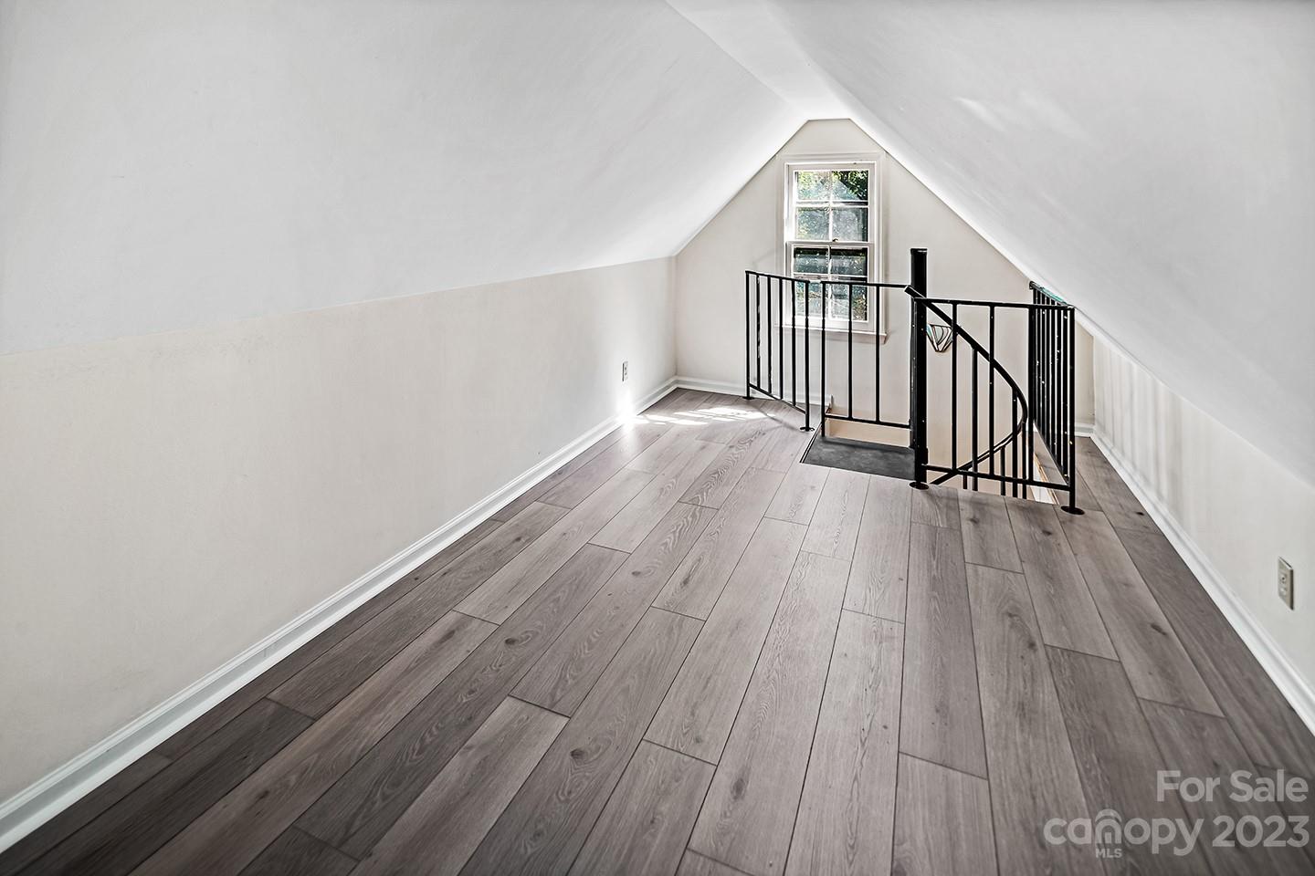 255 Thousand Oaks Road Indian Land, SC 29707 - Photo 25 of 37 a view of a hallway with wooden floor