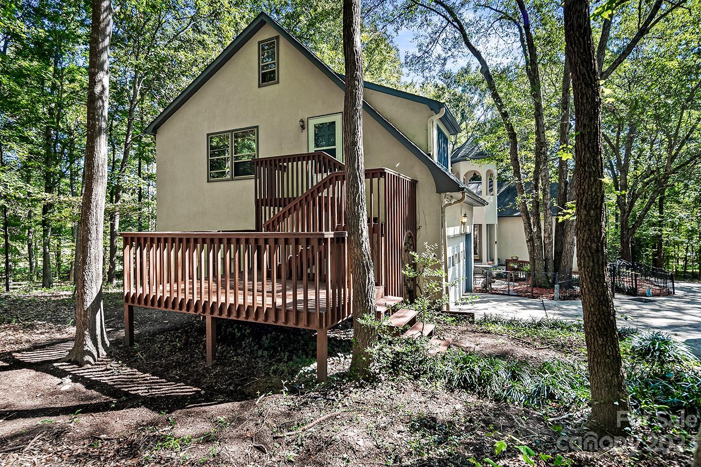 255 Thousand Oaks Road Indian Land, SC 29707 - Photo 33 of 37 a view of a house with a yard and fence