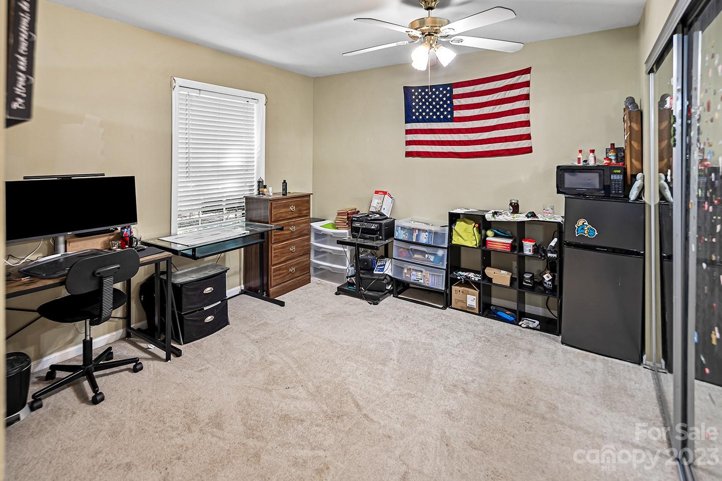 255 Thousand Oaks Road Indian Land, SC 29707 - Photo 37 of 37 a view of a workspace with furniture and a window