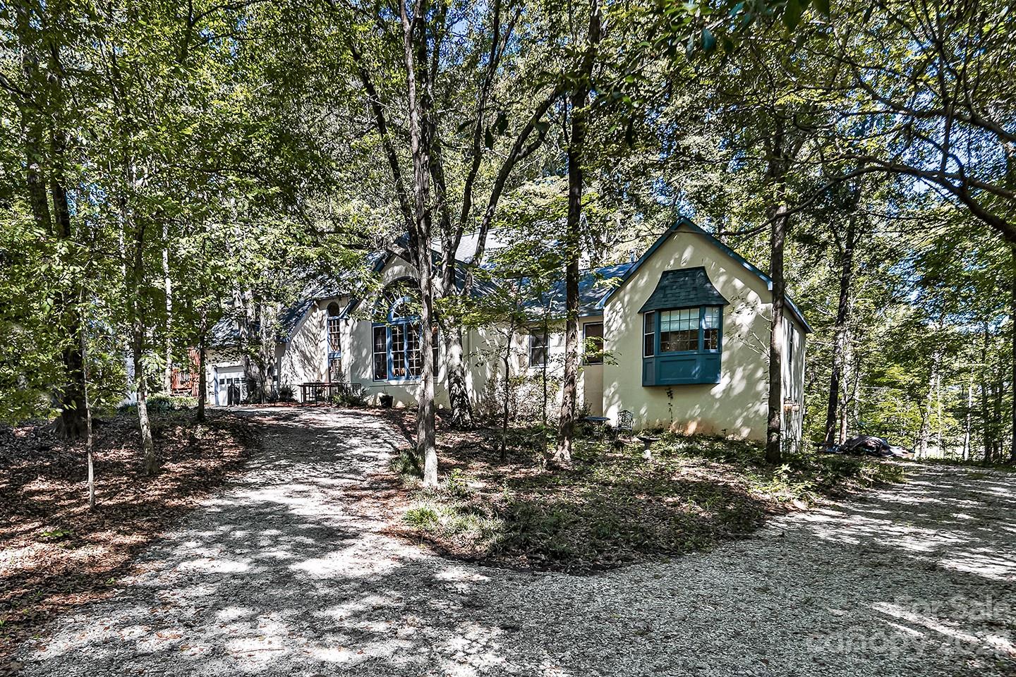 255 Thousand Oaks Road Indian Land, SC 29707 - Photo 4 of 37 a front view of a house with a yard