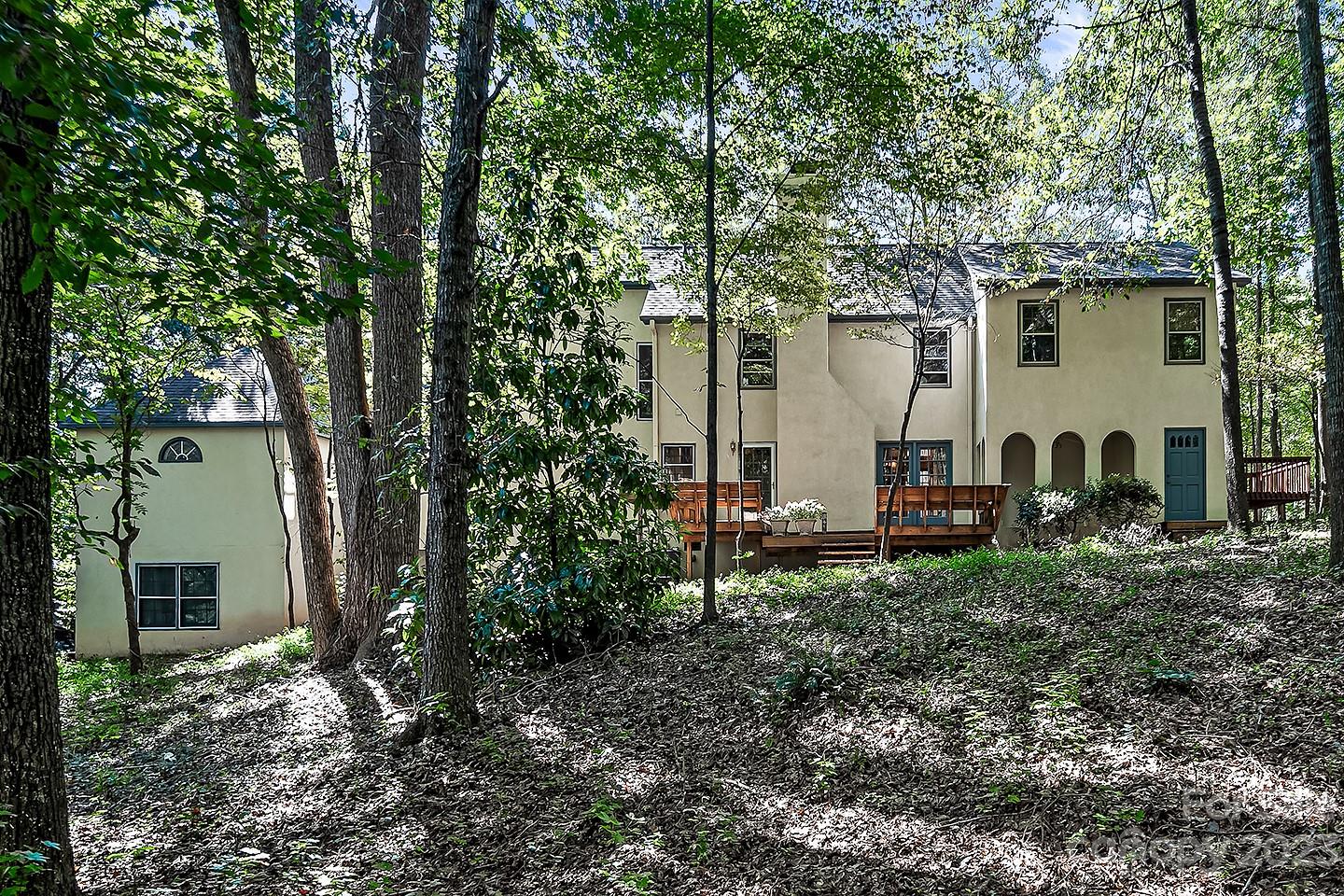 255 Thousand Oaks Road Indian Land, SC 29707 - Photo 5 of 37 a view of a house with backyard and garden