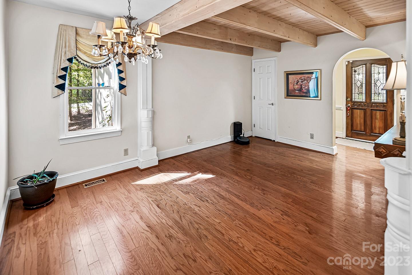 255 Thousand Oaks Road Indian Land, SC 29707 - Photo 9 of 37 a view of empty room with wooden floor and fan