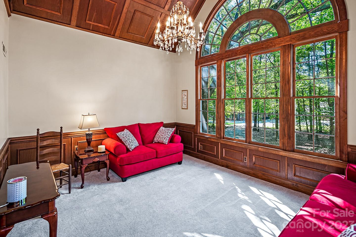 255 Thousand Oaks Road Indian Land, SC 29707 - Photo 10 of 37 a living room with furniture and a large window
